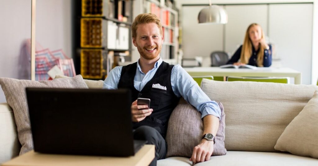 office worker man sitting on a couch