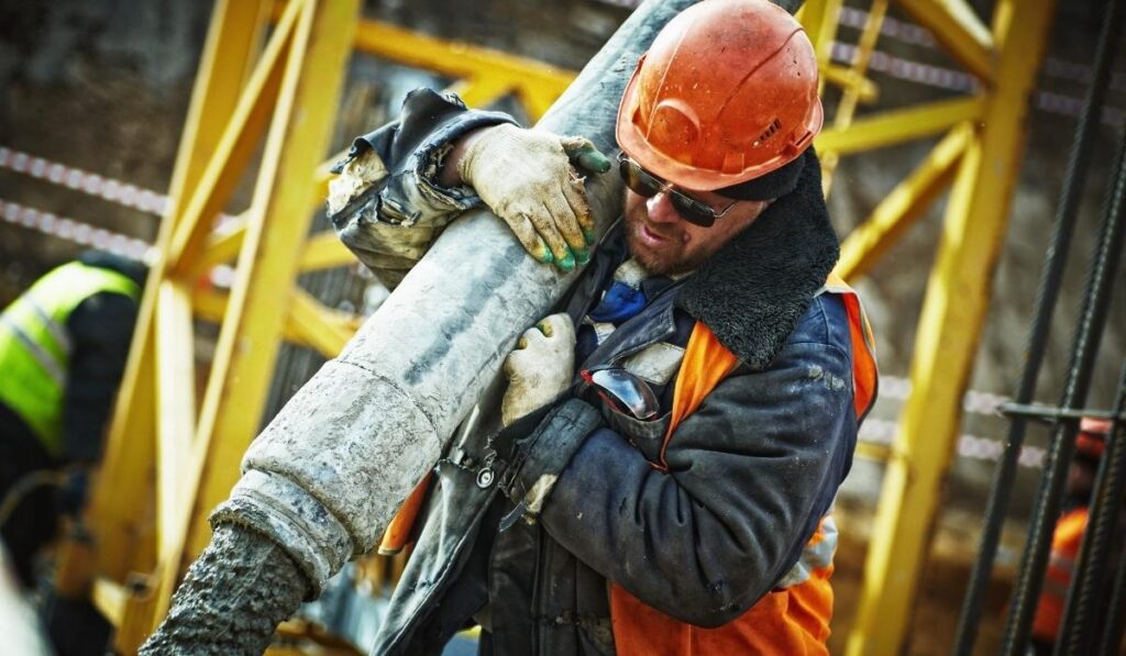 orange helmet and jacket worker