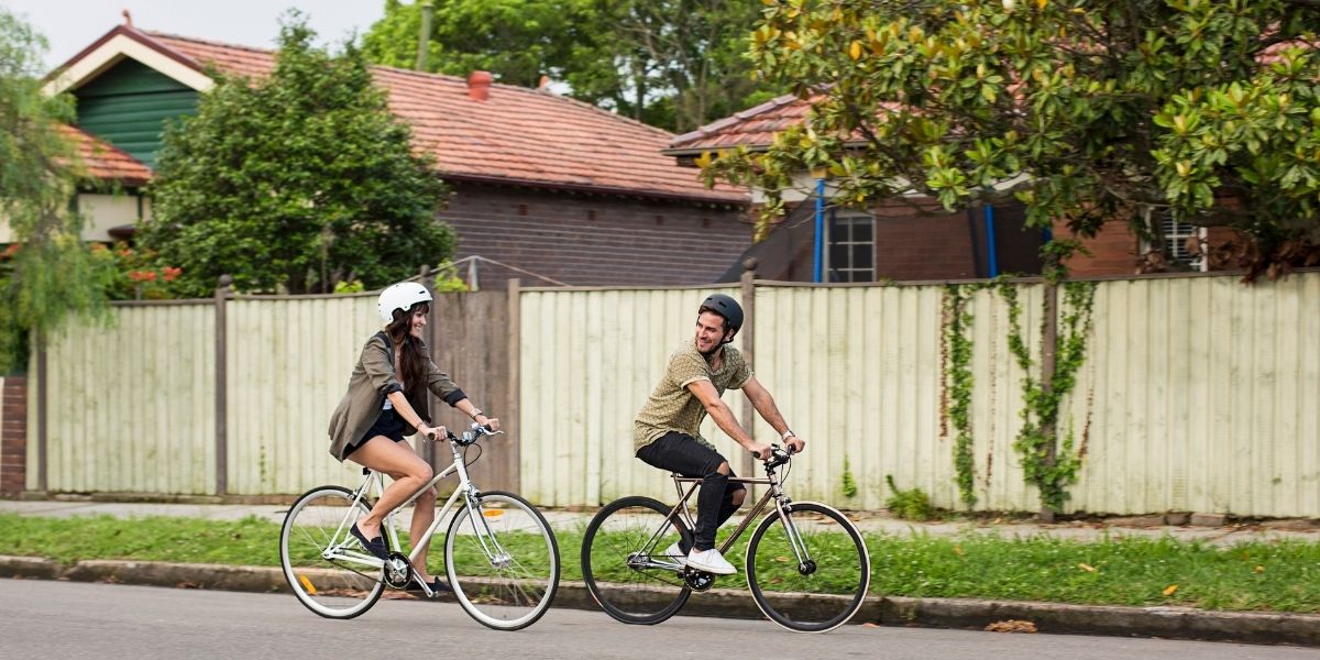 happy couple cycling in NSW, Australia