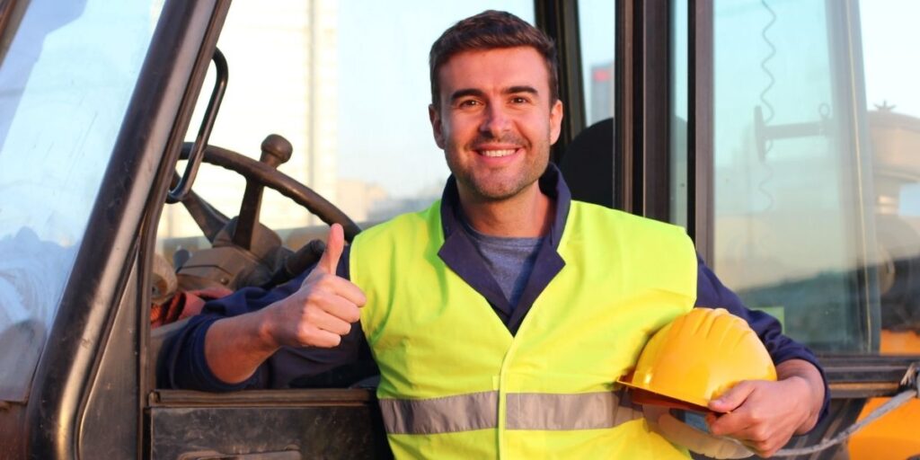 happy male worker thumbs up