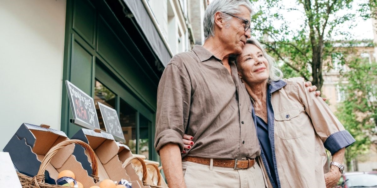 retired couple hugging each other