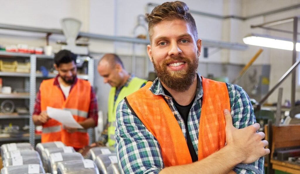 smiling worker after permanent impairment benefit