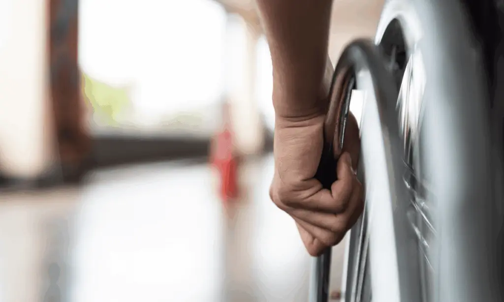 in wheelchair after mobility loss claim