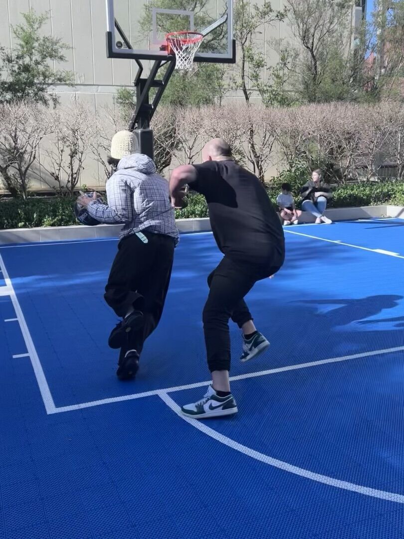 Withstand Lawyers team members playing basketball together