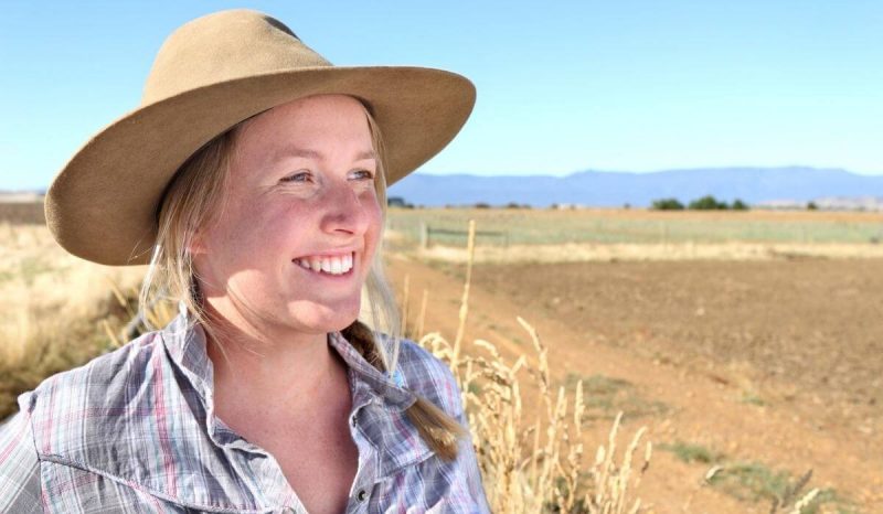 happy female farmer with a hat