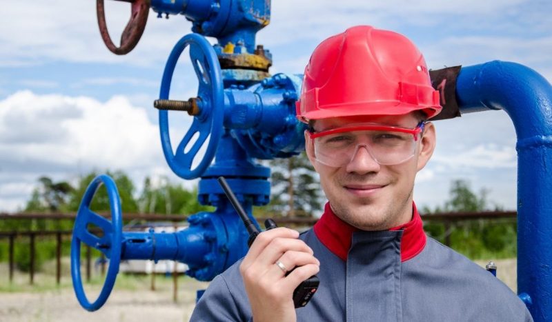 worker using helmet to protect his head from injury and concussion or brain damage